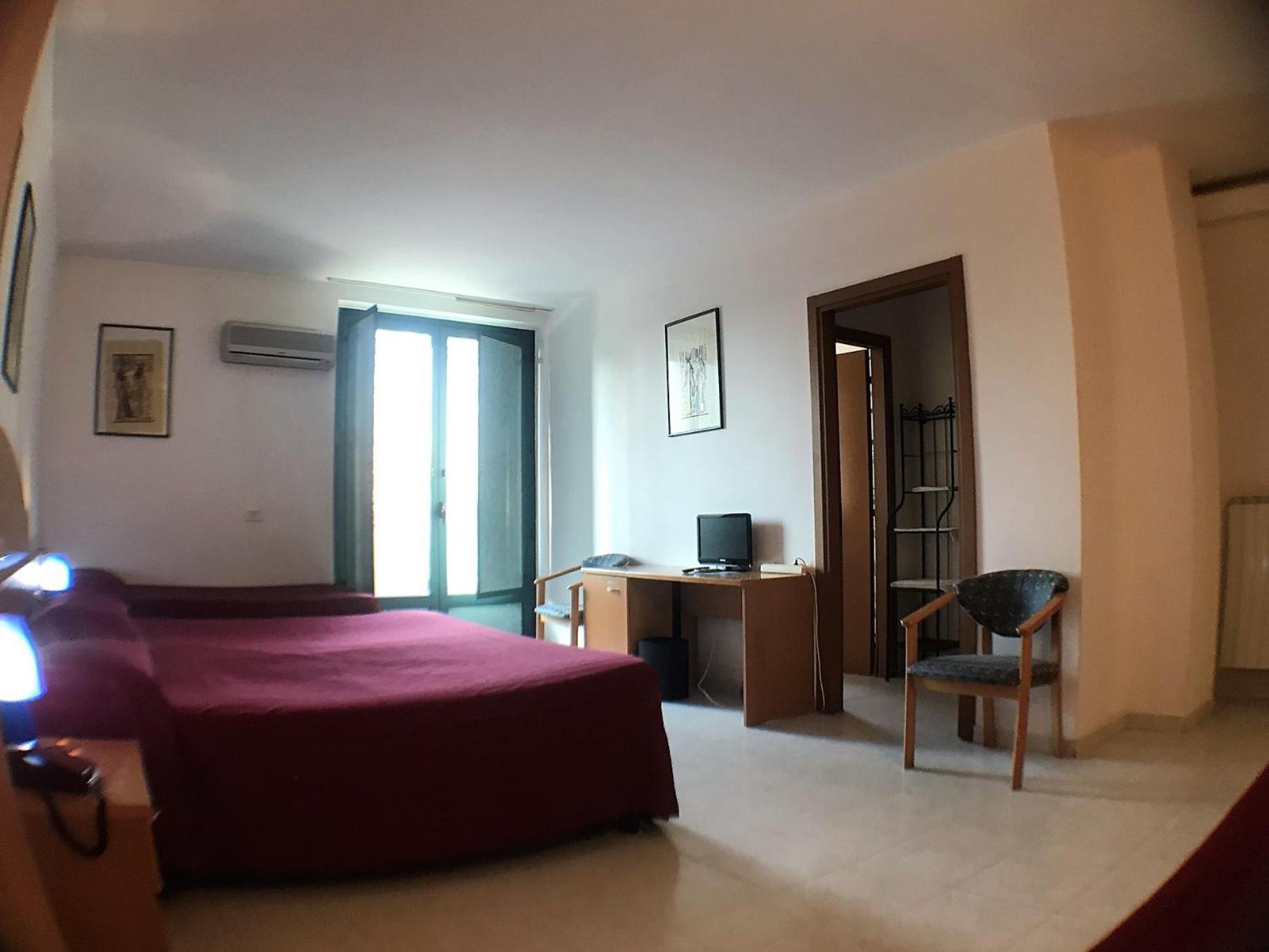 Ascot Lodging Cardano Al Campo Chambre photo